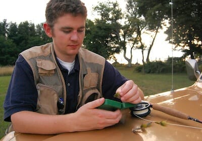 Tait with his truck and fishing gear